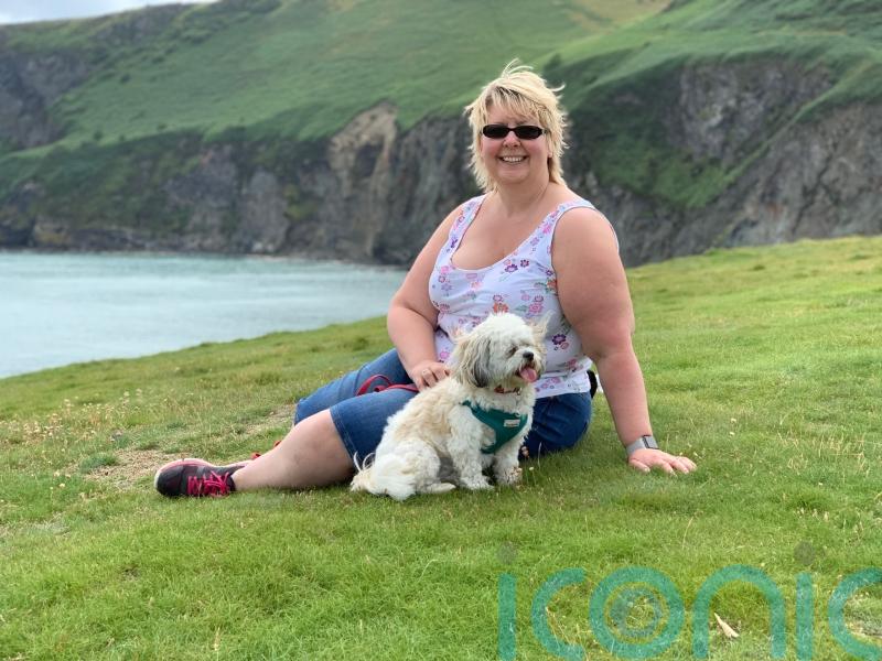 Shopworker who shed weight before hitting the menopause bursts into tears of joy after losing 7st 8lb and fitting into slinky Levi&rsquo;s jeans