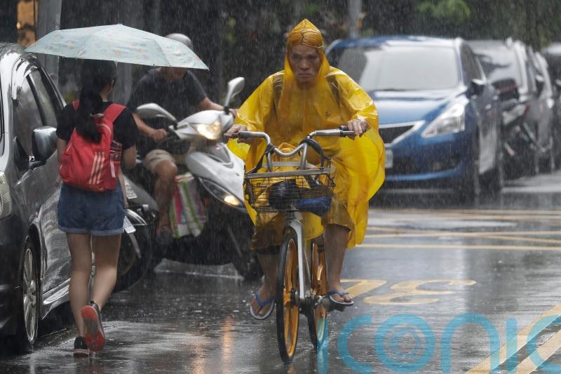 Ferries, schools and flights suspended in path of Typhoon Hinnamnor