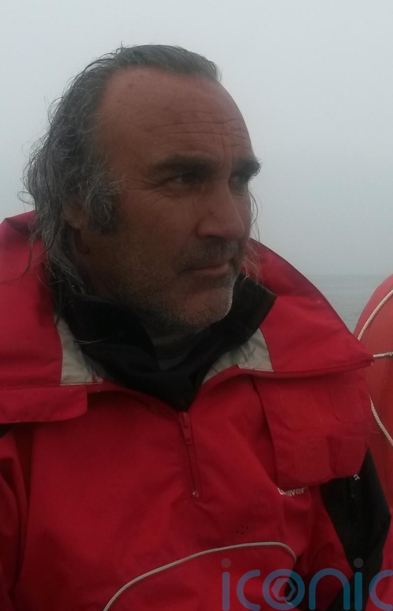 Tributes paid as body found in search for missing academic