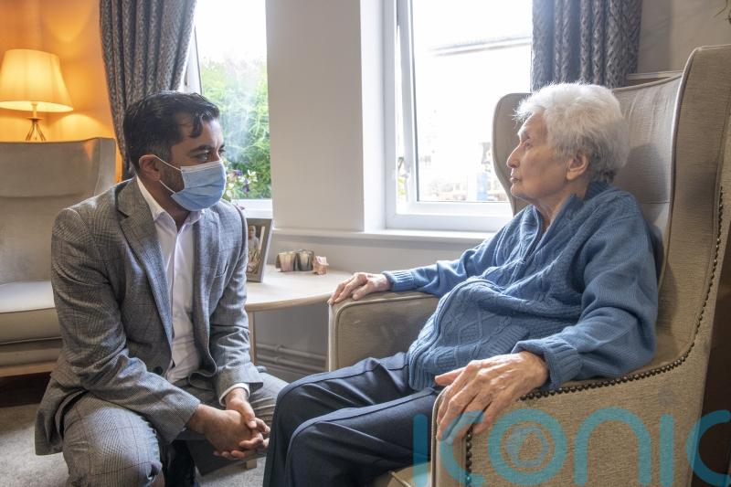 Humza Yousaf visits care home as residents among first to get Covid-19 booster