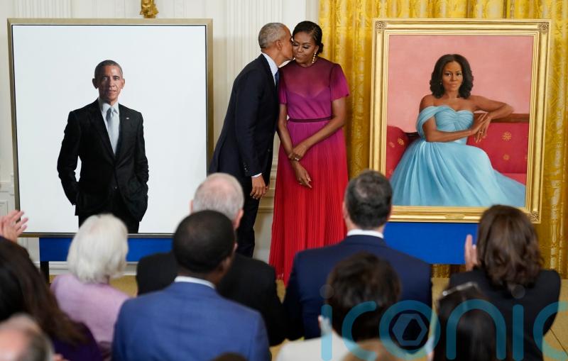 Obamas unveil their White House portraits
