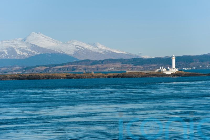Two rescued from life raft after abandoning sinking boat
