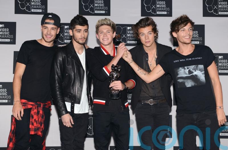 Louis Tomlinson hints at One Direction reunion during chat with Lorraine Kelly