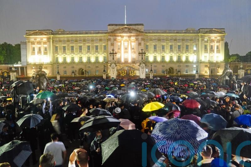 Global media outlets flock to Buckingham Palace to report on Queen’s death