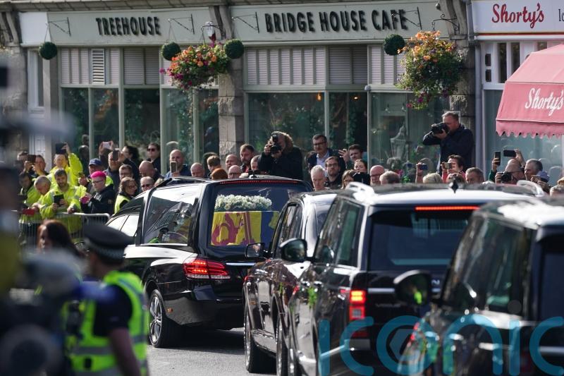 Queen’s ‘neighbours’ pay respects as hearse passes through Ballater
