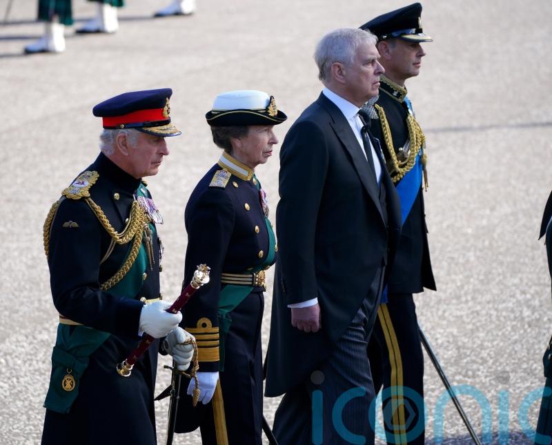 Queen’s children led by Charles walk behind late monarch’s coffin