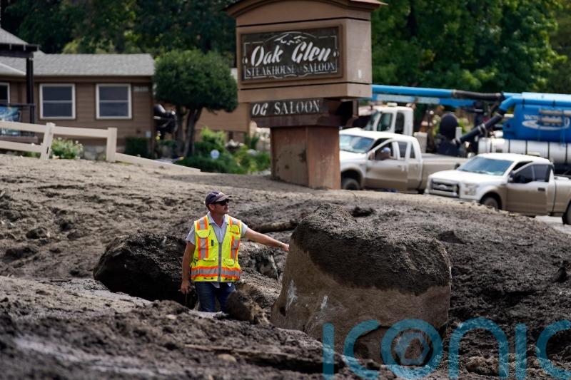 Clean-up begins after mudslides sweep through California mountain communities