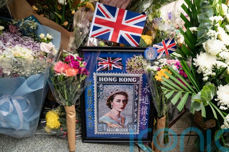 Public grief over Queen ‘doubles as dissent’ in Hong Kong