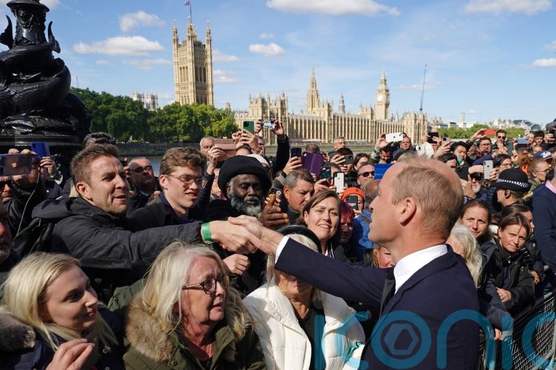 Mourners squeal, cheer and break down in tears on meeting Charles and William