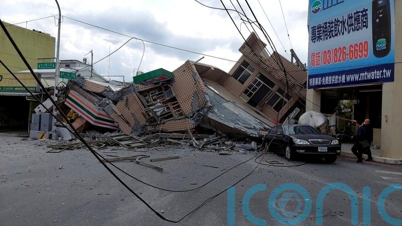 Building collapses and landslide traps tourists on mountain after Taiwan quake