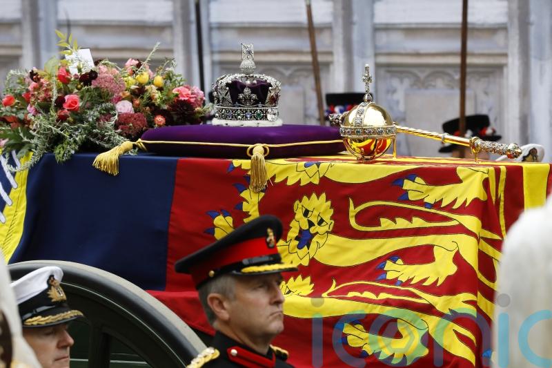 Queen’s coffin makes its final journey to Windsor Castle