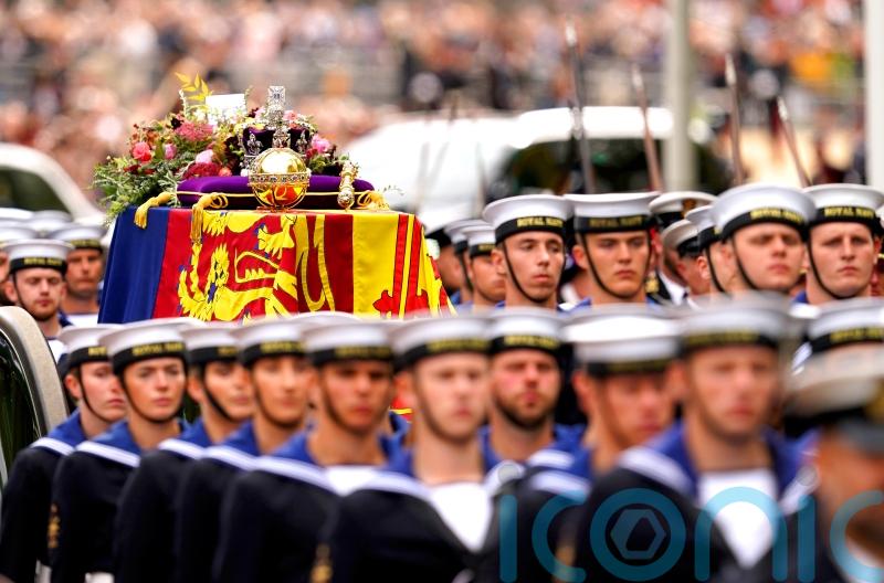 Hundreds gather to watch state funeral as Queen’s service to nation praised