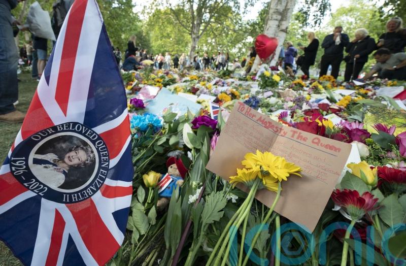Thousands spill into Hyde Park to watch Queen’s coffin pass by