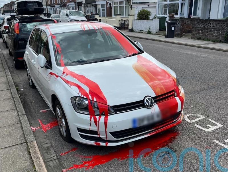 Volkswagen Golf left drenched in red paint after it was left parked in a disabled bay