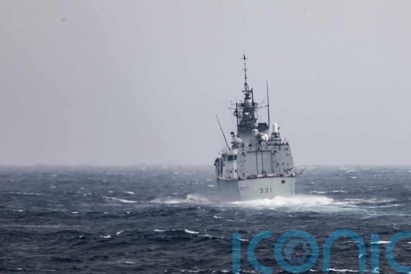 China dials down Taiwan rhetoric as US and Canada transit strait