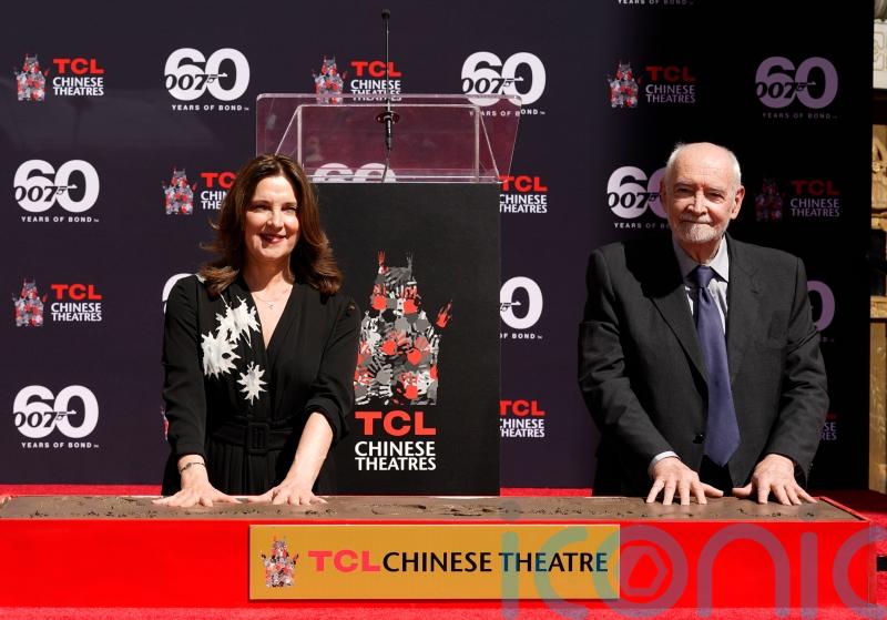 Bond producers praise 007 team as they cement their handprints in Hollywood