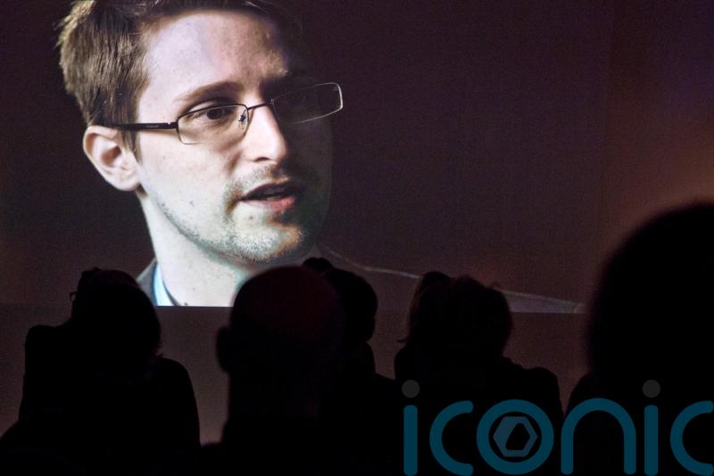Vladimir Putin grants Russian citizenship to NSA whistleblower Edward Snowden
