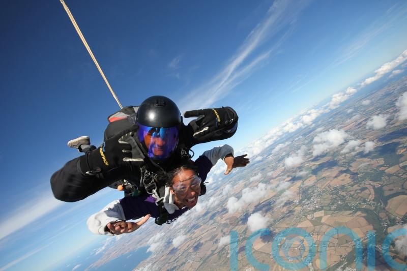 This woman hid her ’embarrassing’ secret health condition for a decade – now a skydive has boosted her confidence and she is telling the world