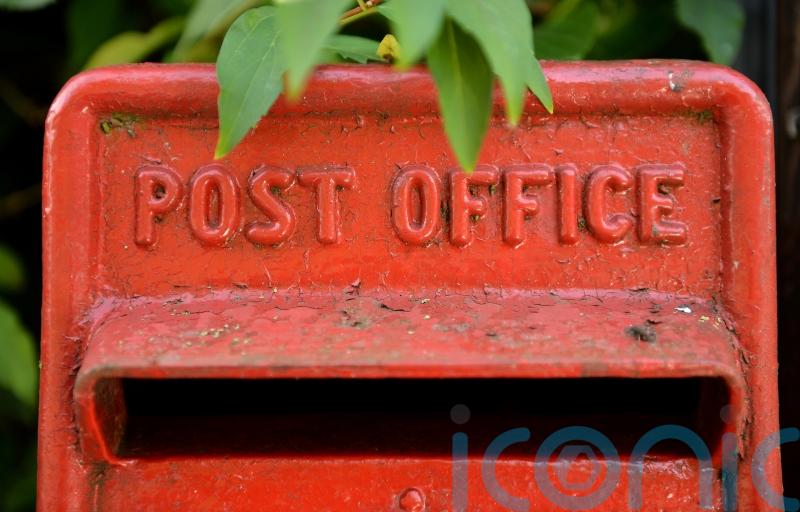 Thousands of Post Office workers walk out in strike action