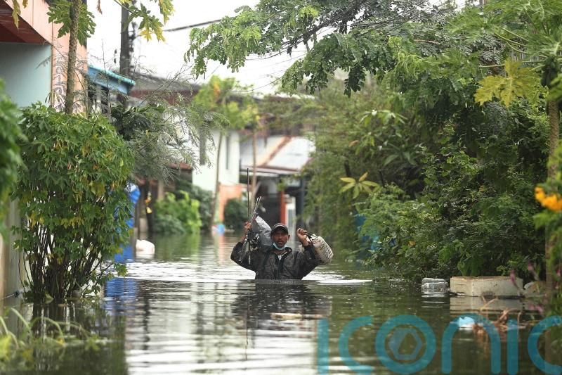 Tropical rains flood parts of Thailand as 5,000 seek shelter
