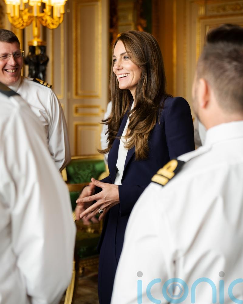 Kate all smiles as she meets Royal Navy sailors at Windsor Castle