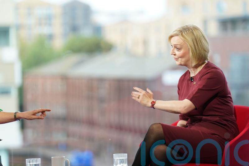 Liz Truss does not rule out real-term benefits cuts but guarantees pension hike