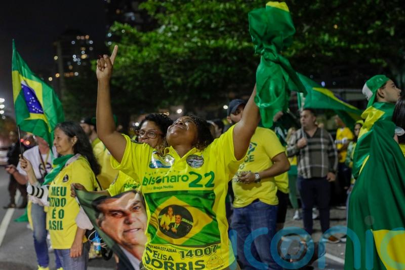 Bolsonaro and Lula appear headed for run-off in Brazil’s polarised election race