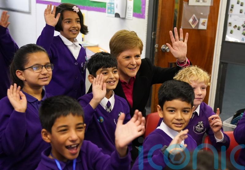 Sturgeon visit school reports online racist abuse of pupils to police