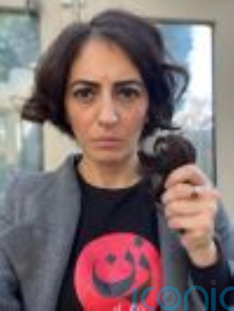 Stop trading with Iran says Anoosheh Ashoori’s daughter, as she cuts hair on TV