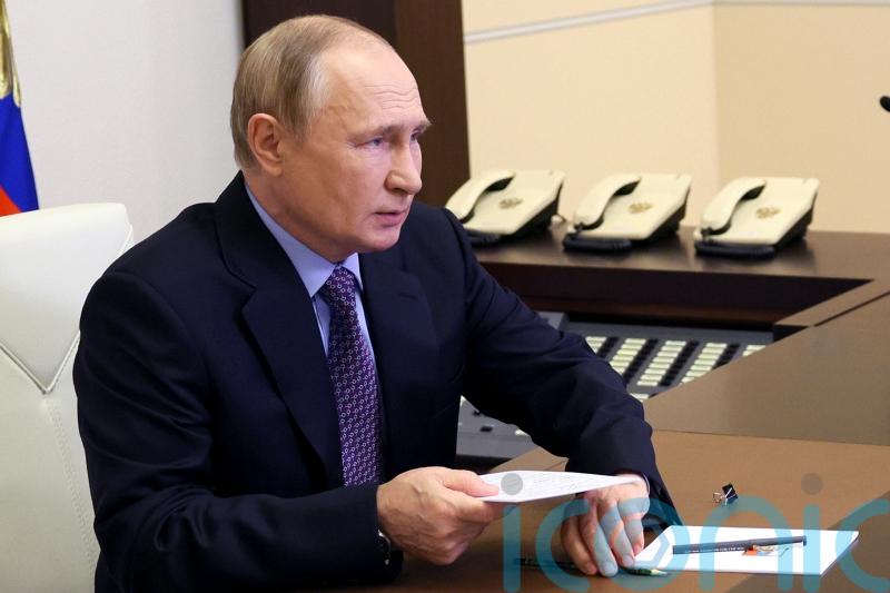 Belarus leader gives Putin a tractor voucher on 70th birthday