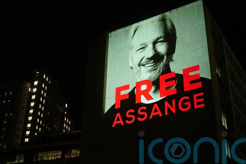Russell Brand and Jeremy Corbyn join human chain to support Julian Assange