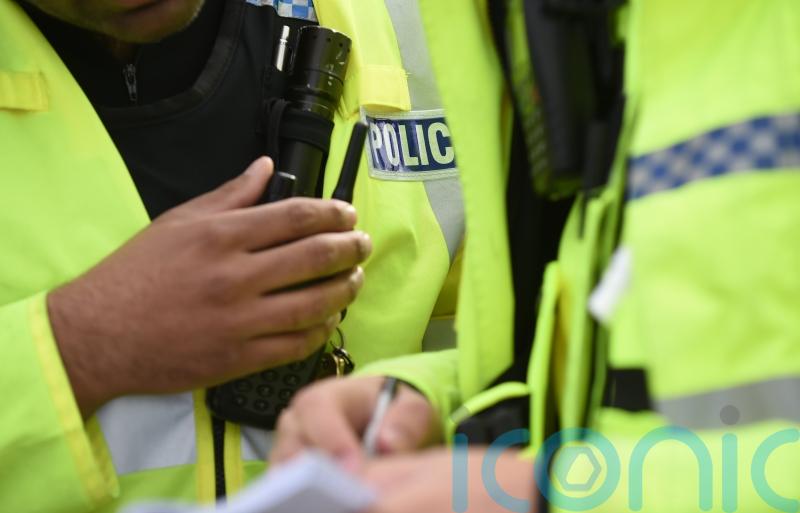 Man arrested on suspicion of murder after pedestrian hit by car outside takeaway