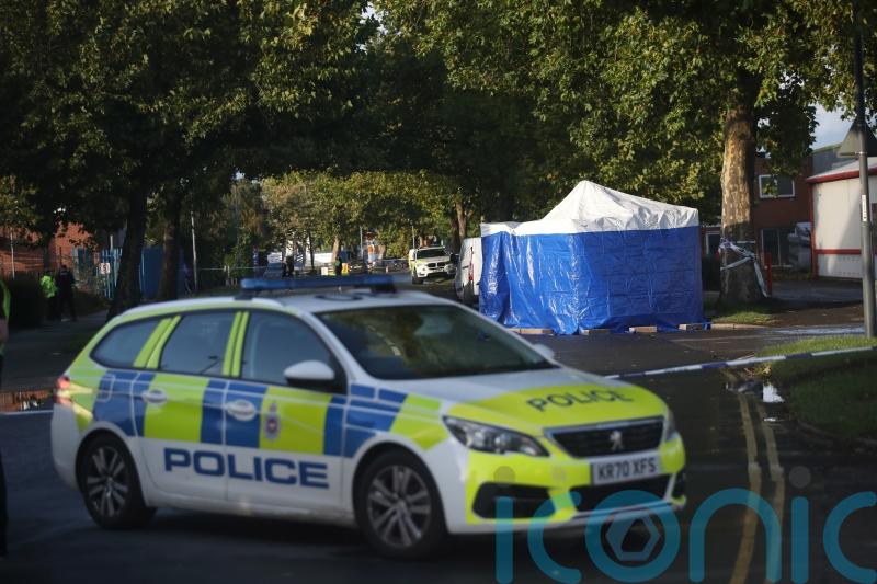 Man who died after being shot by armed officers at police station is named
