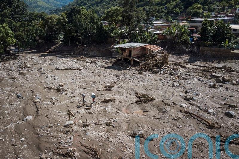 Tales of survival emerge as Venezuela landslide death toll hits 34
