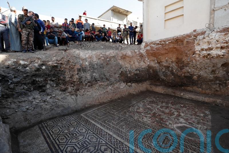 Archaeologists dig up Roman mosaic in former rebel stronghold in Syria