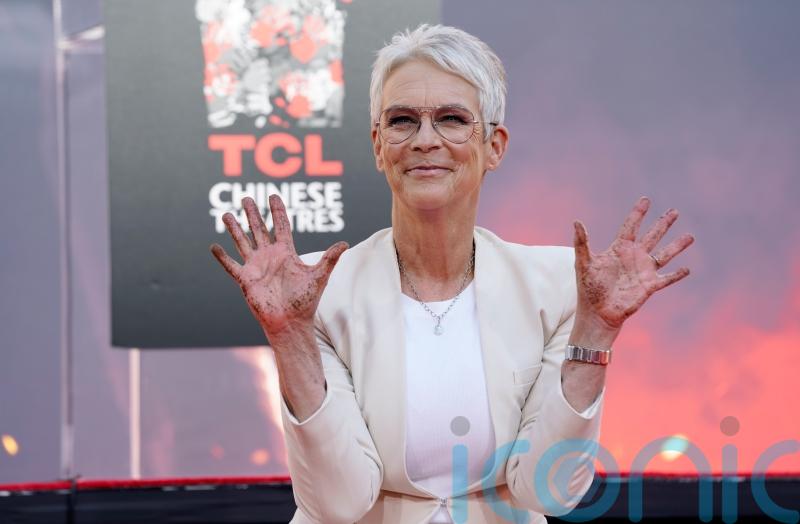 Jamie Lee Curtis calls herself a ‘dot-connector’ as she cements her handprints