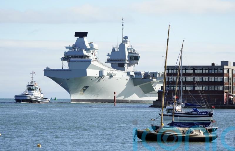 HMS Queen Elizabeth returns to home port after replacing sister ship on US visit
