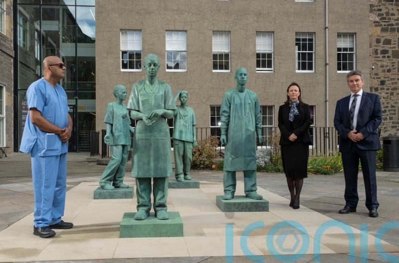 Surgeons recall sacrifices made by NHS staff in pandemic as sculpture unveiled