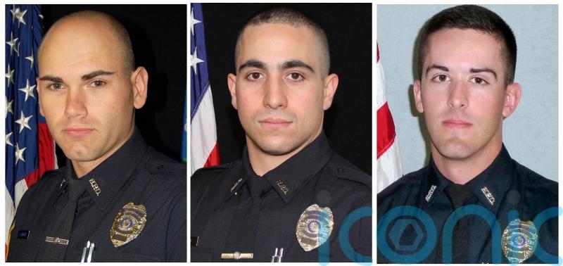 Wounded police officer shot suspect who killed two colleagues