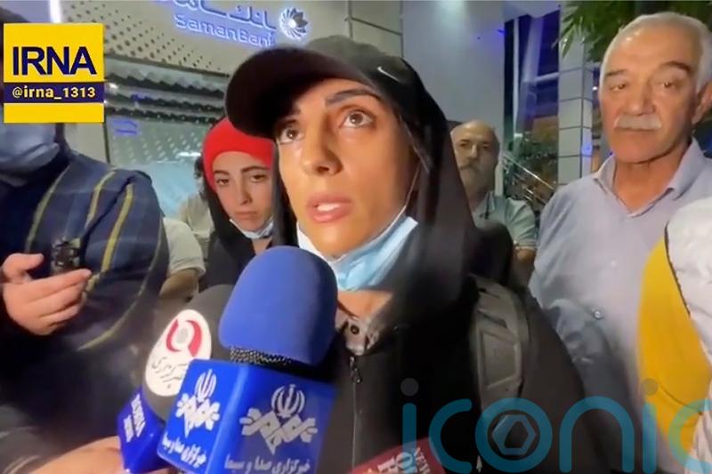 Controversial Iranian climber receives hero’s welcome in Tehran