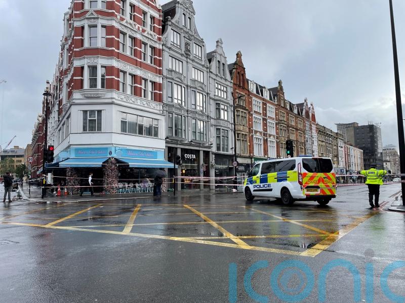 Suspect caught by members of public after woman stabbed in coffee shop