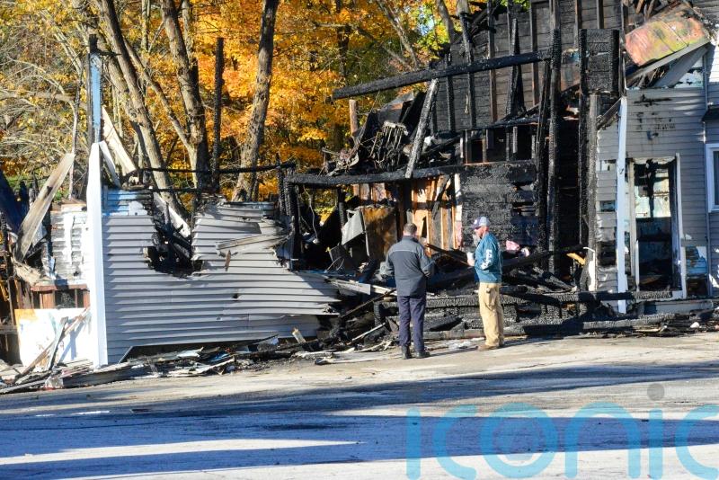 Two killed as small plane hits US building
