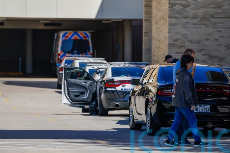 Gunman wounded by police after two staff killed in Dallas hospital shooting