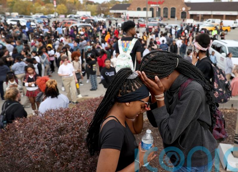 Two killed in shooting at St Louis high school and gunman dead