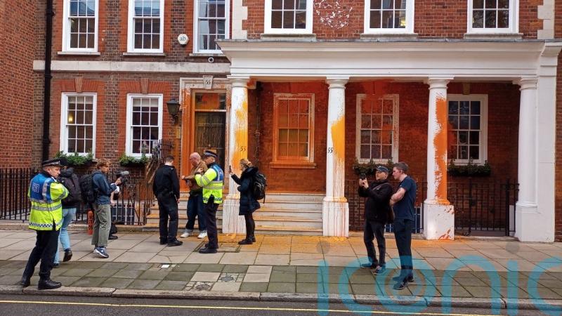 Just Stop Oil protesters spray paint HQ of climate sceptic think tank in London