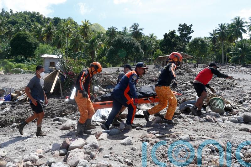 Philippines storm victims feared tsunami and ran towards mudslide