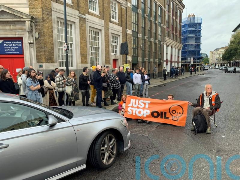 Woman with sick child shouts at Just Stop Oil activists for blocking roads
