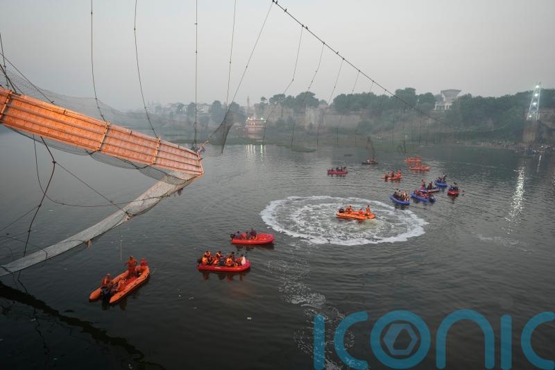 Suspension bridge collapse kills at least 133 in India