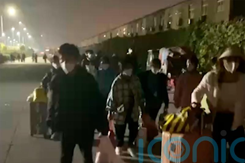 Workers walk out of China iPhone factory amid Covid lockdowns