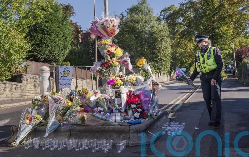 Teenage pair deny murdering boy outside school gates